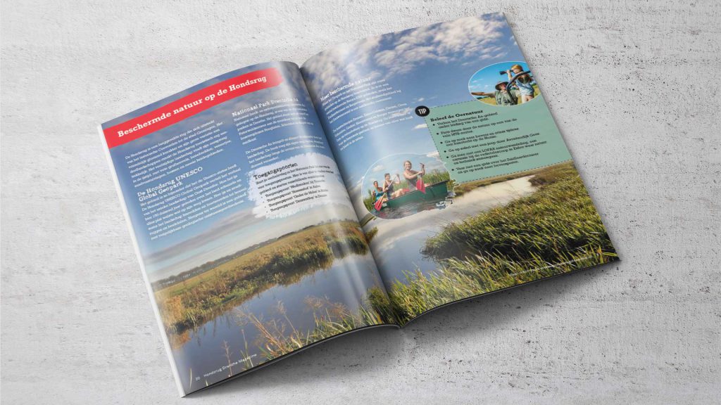 Open Hondsrug Magazine met een landschap en water